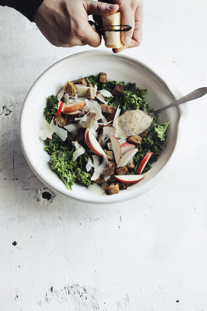 autumn salad with kale, apples, and croutons.