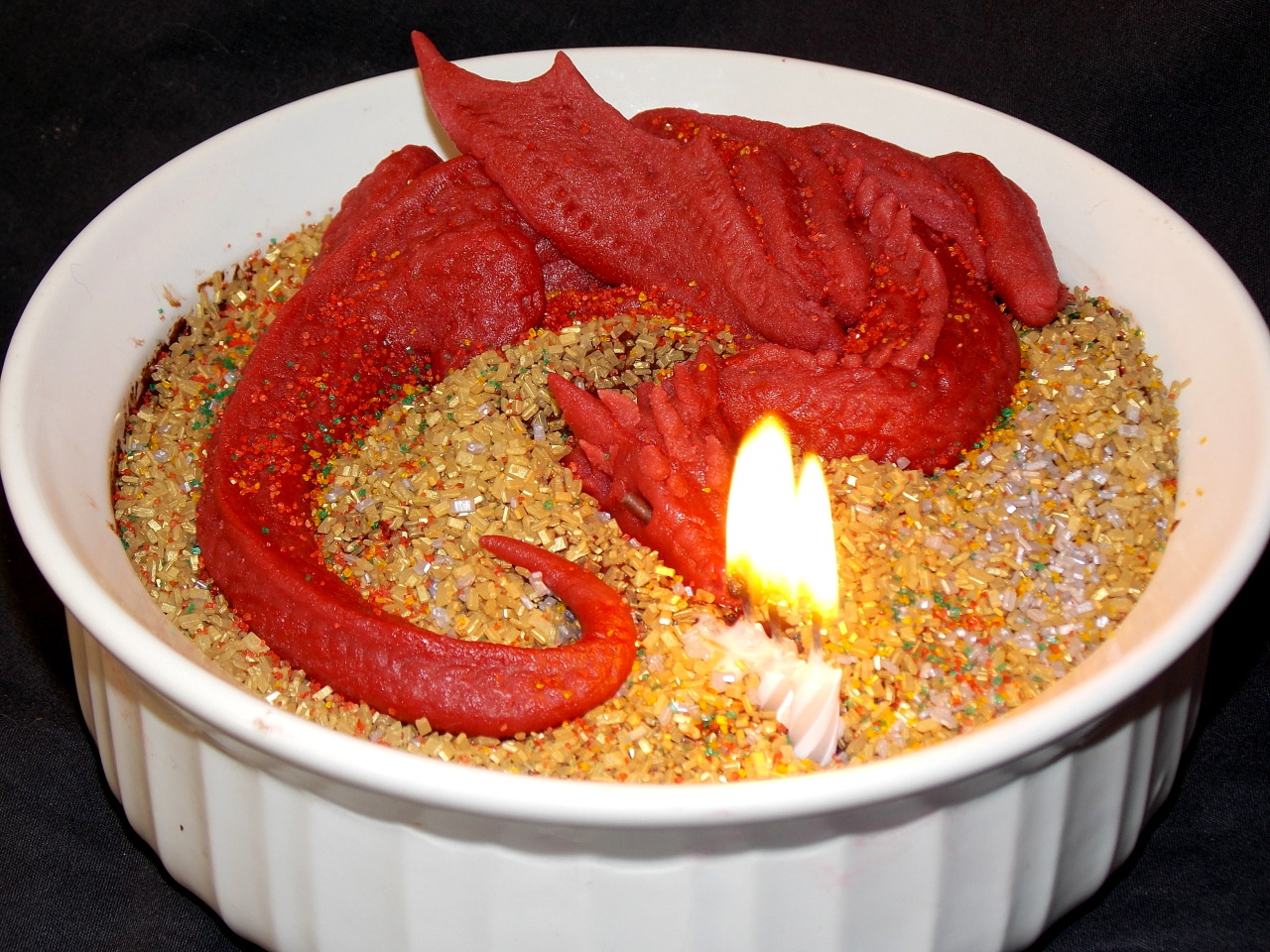 Marzipan Smaug atop a treasure of golden sprinkles and rich chocolate souffle. As fun to eat as he was to make!