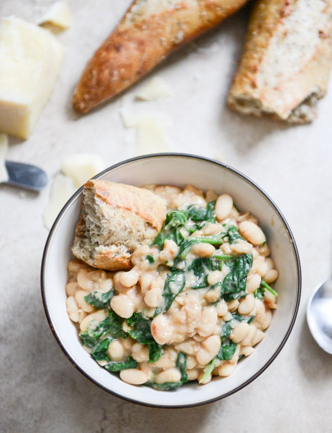 Creamy Parmesan White Bean Stew with Spicy Greens. (via http